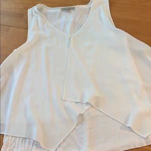 White flowy sleeveless blouse